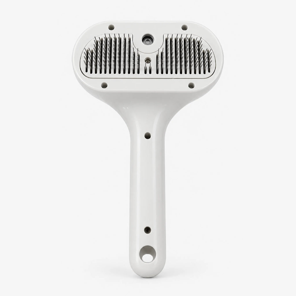 Handheld pet grooming brush with white handle and dual rows of metal bristles