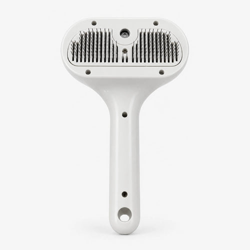 Handheld pet grooming brush with white handle and dual rows of metal bristles