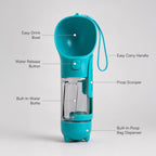 Teal pet waste cleanup dispenser with carry handle, scoop, and bag compartment