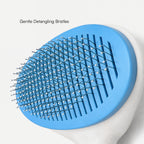Blue circular brush head with gentle detangling pin bristles