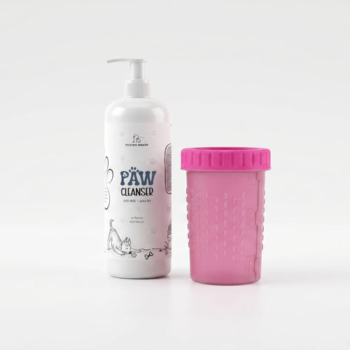 White paw cleanser bottle and pink cup with ribbed lid