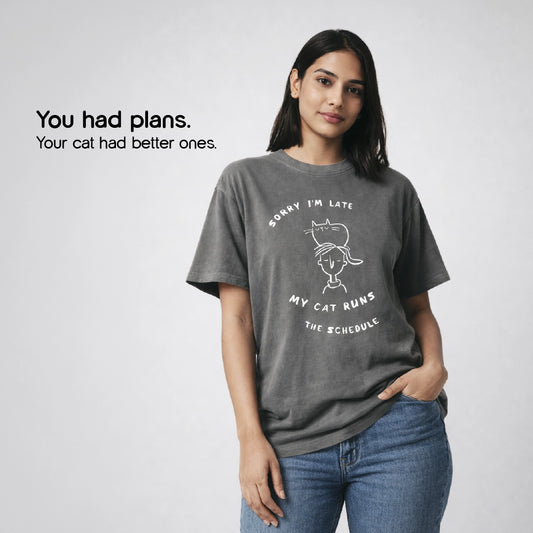 My Cat Runs the Schedule T-Shirt – Oversized Cotton Wear for Cat Parents