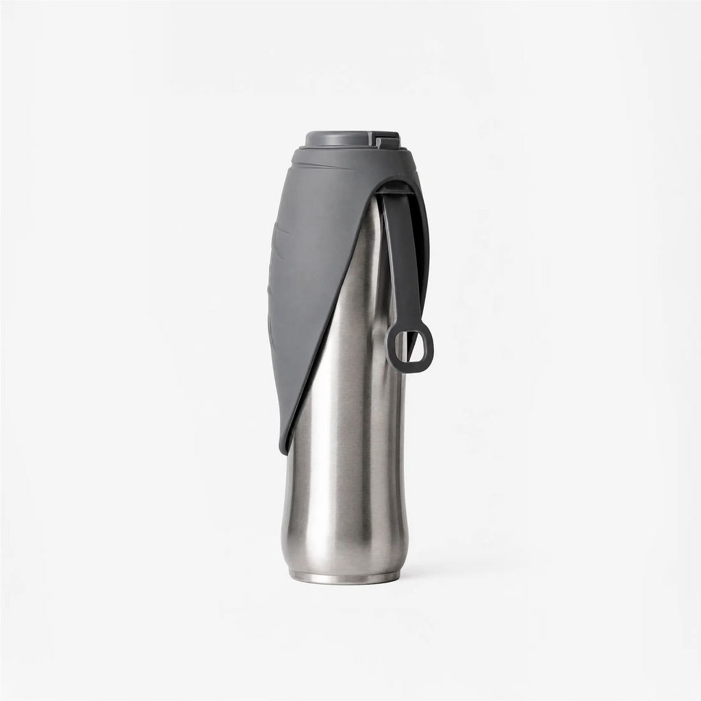 Stainless steel insulated bottle with gray sleeve, black spout cover, and loop handle