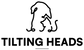 A minimalist black line art logo of a tilted dog above the text 'TILTING HEADS' in bold black uppercase letters on a solid white background.