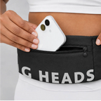 Hands-free dog belt pocket holding a smartphone; black fabric with zipper