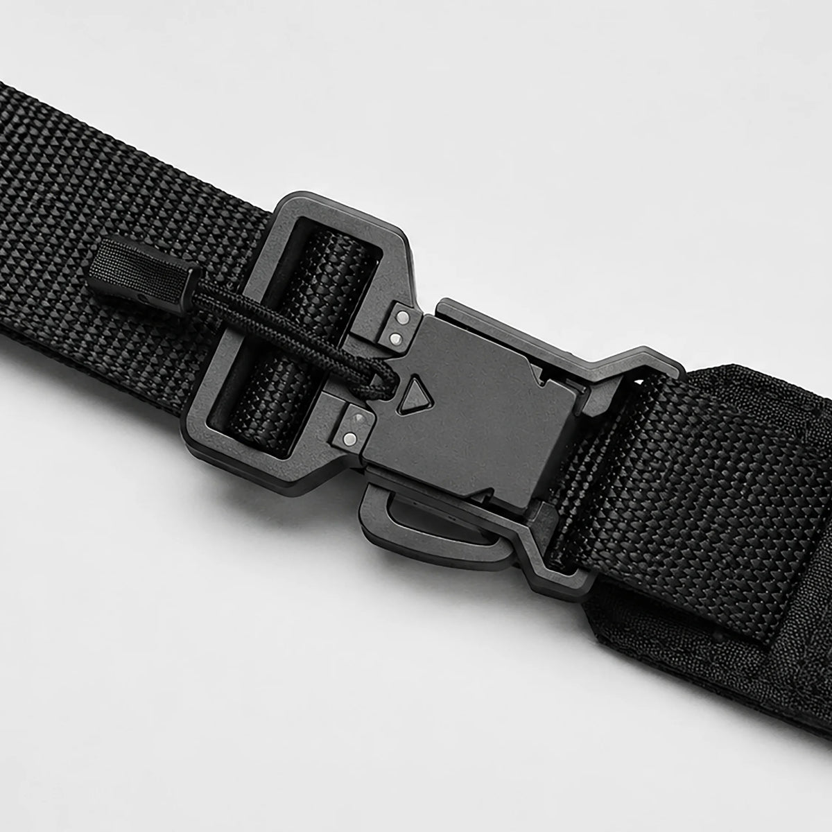 Close-up of black belt strap with plastic buckle and metal snap hardware