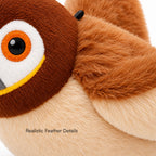 Close-up of plush bird face with orange-ringed eye and soft feather details